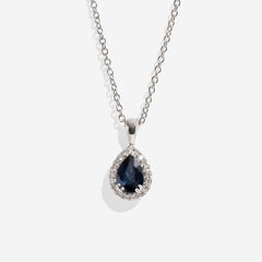 Sapphire pendant on white background