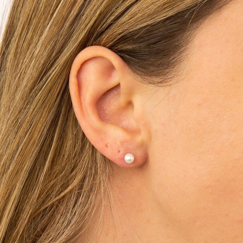 Pearl Stud Earrings - 5MM | 9ct Gold - model photo