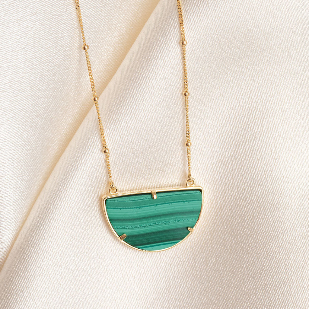 malachite half moon necklace in yellow gold