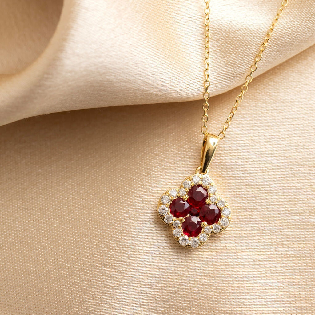 Petite ruby diamond necklace on fabric