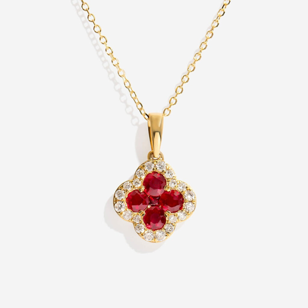 Petite ruby diamond necklace on white background