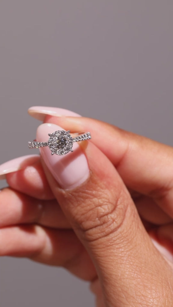 Zoe cluster engagement ring video on hand