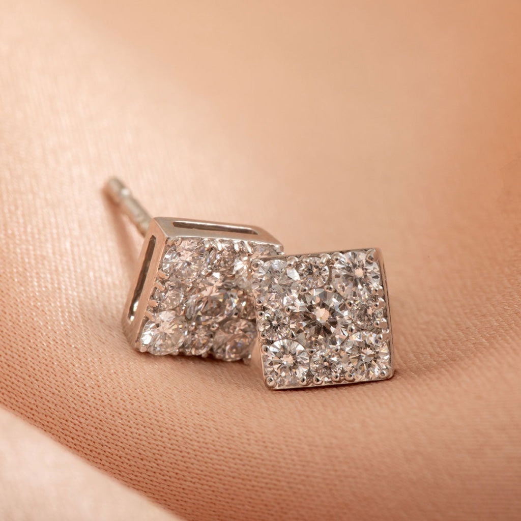 Princess Cluster Diamond Earrings on fabric
