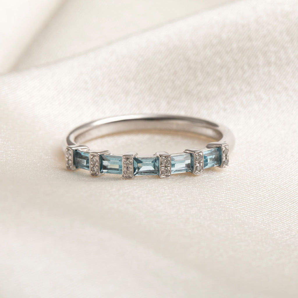 diamond and blue topaz eternity ring 