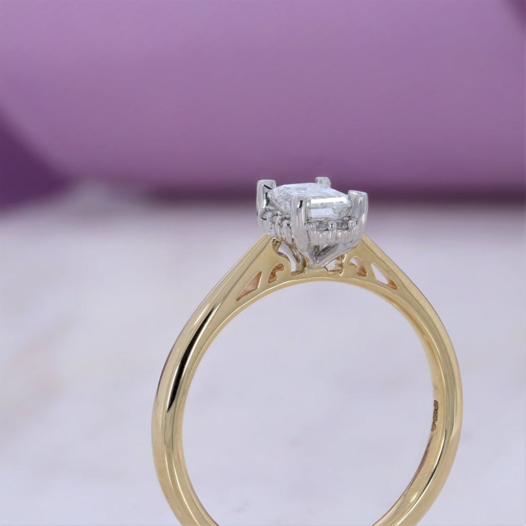Yellow gold and platinum Emerald cut diamond Ring