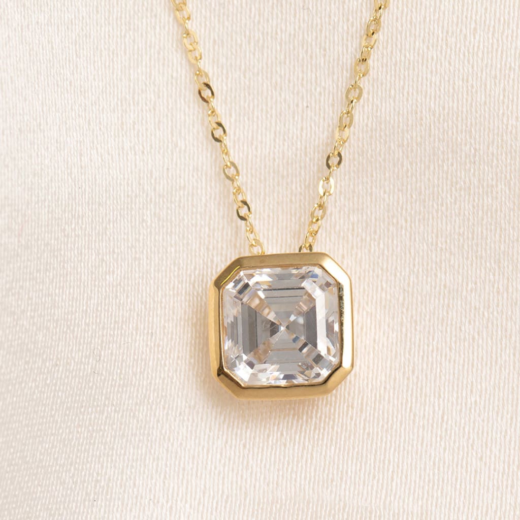 close up of bezel set asscher cubic zirconia stone