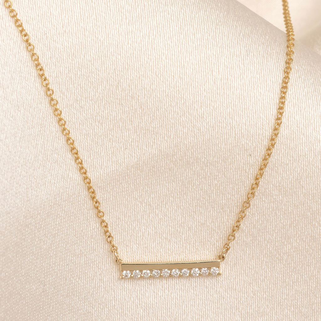 diamond set yellow old bar necklace 