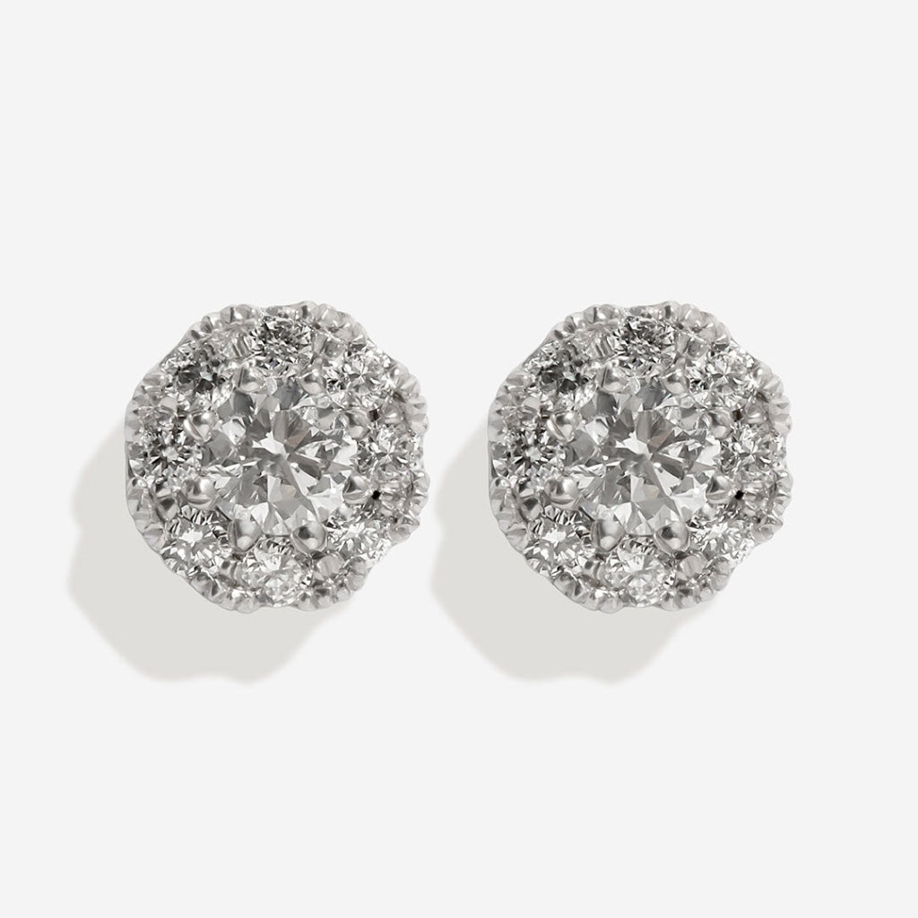 Round halo diamond earrings 0.52ct on white background