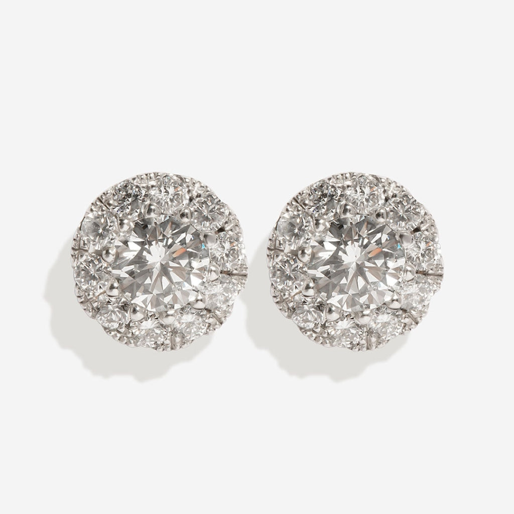0.75ct round halo earrings on white background