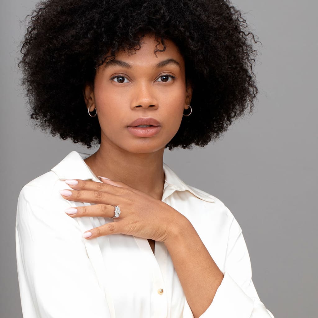 Wide shot of model wearing Royal engagement ring