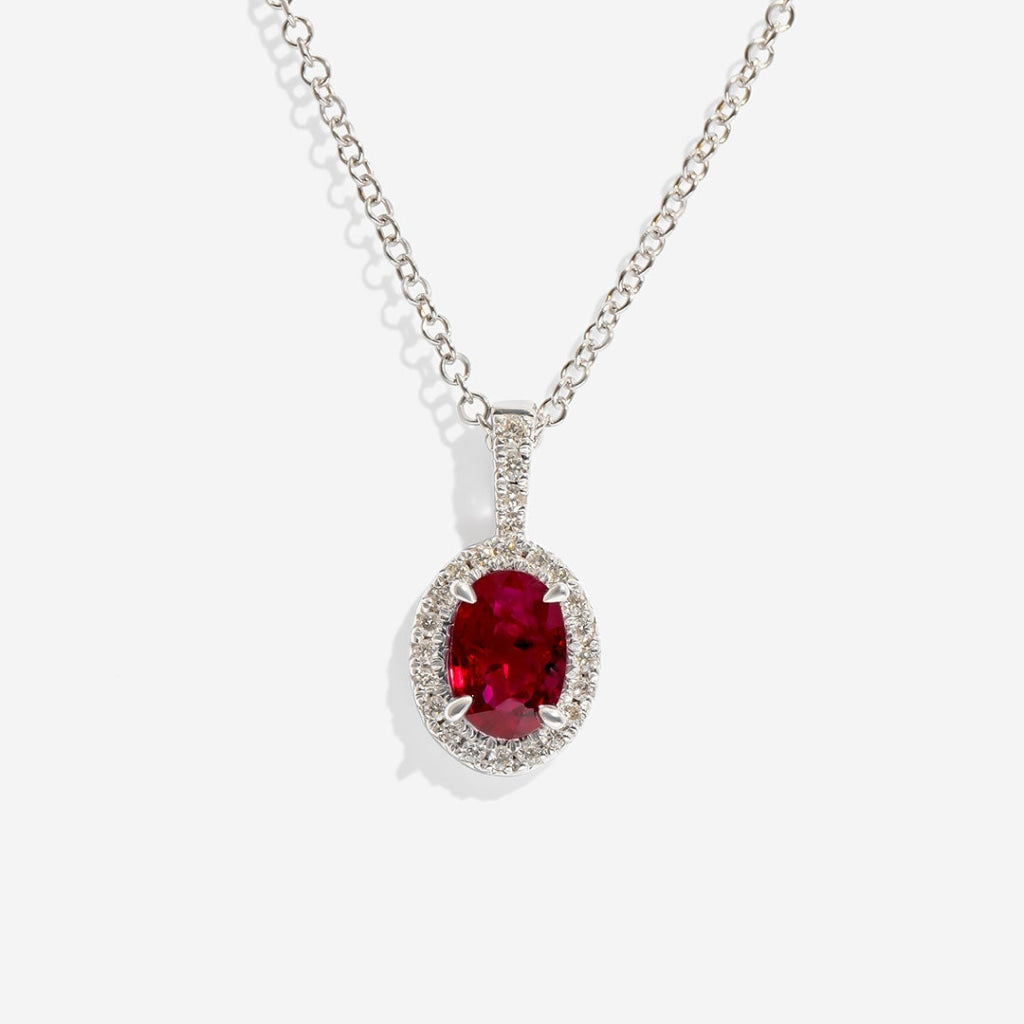 ruby and diamond necklace on white background