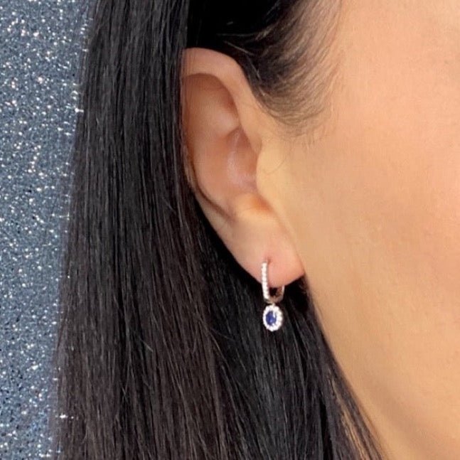 sapphire and diamond earring on model