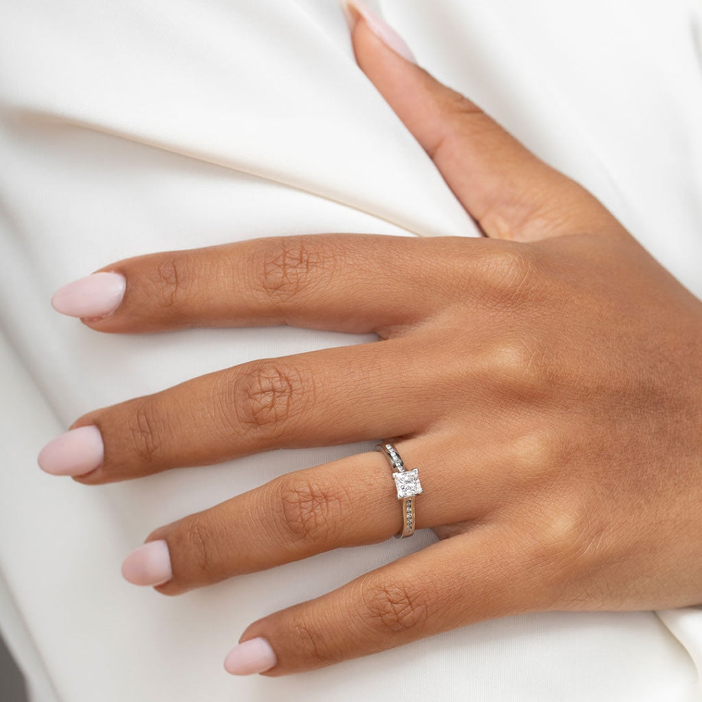 princess cut engagement ring on women's hand