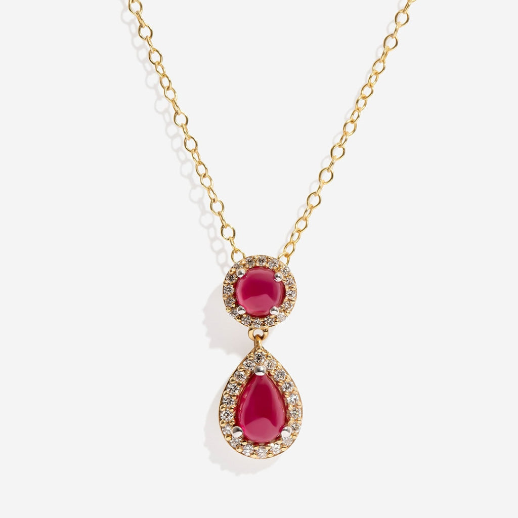 ruby and diamond necklace on white background