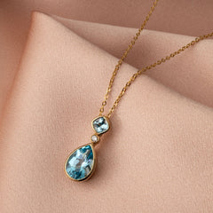 Swiss blue topaz necklace - 9ct Gold