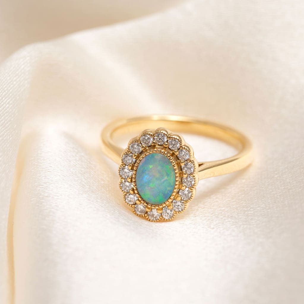 opal engagement ring on fabric side view