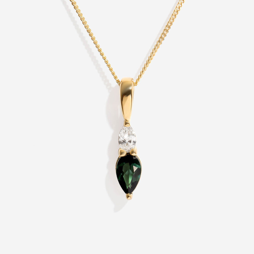 tourmaline diamond necklace on white background