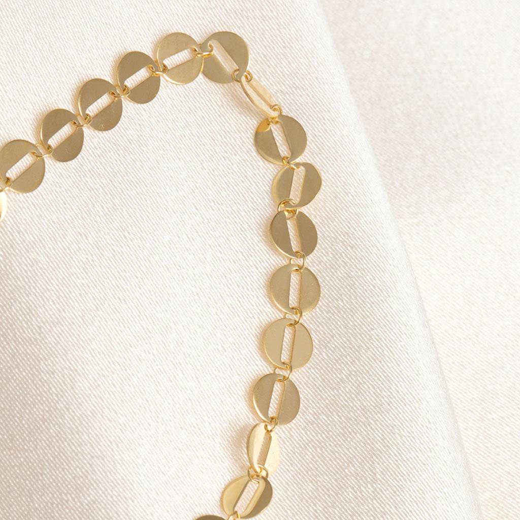 round yellow gold disc link bracelet