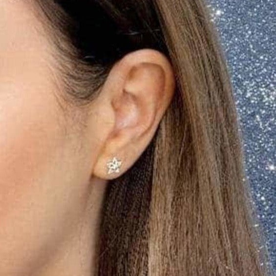 Woman wearing 9ct gold Twinkle Twinkle Earrings | Gear Jewellers Dublin