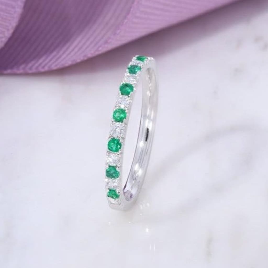 Diamond and emerald eternity ring