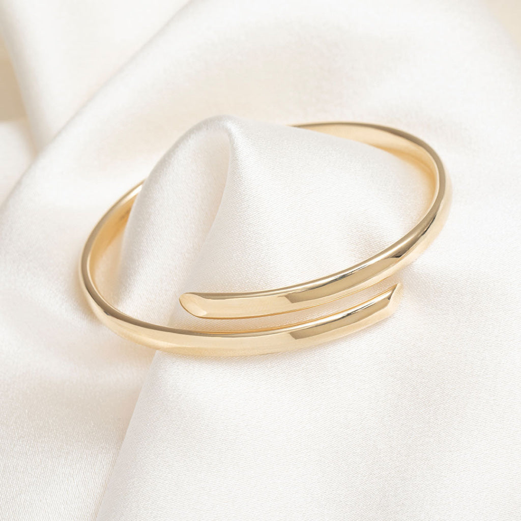 close up of yellow gold bangle