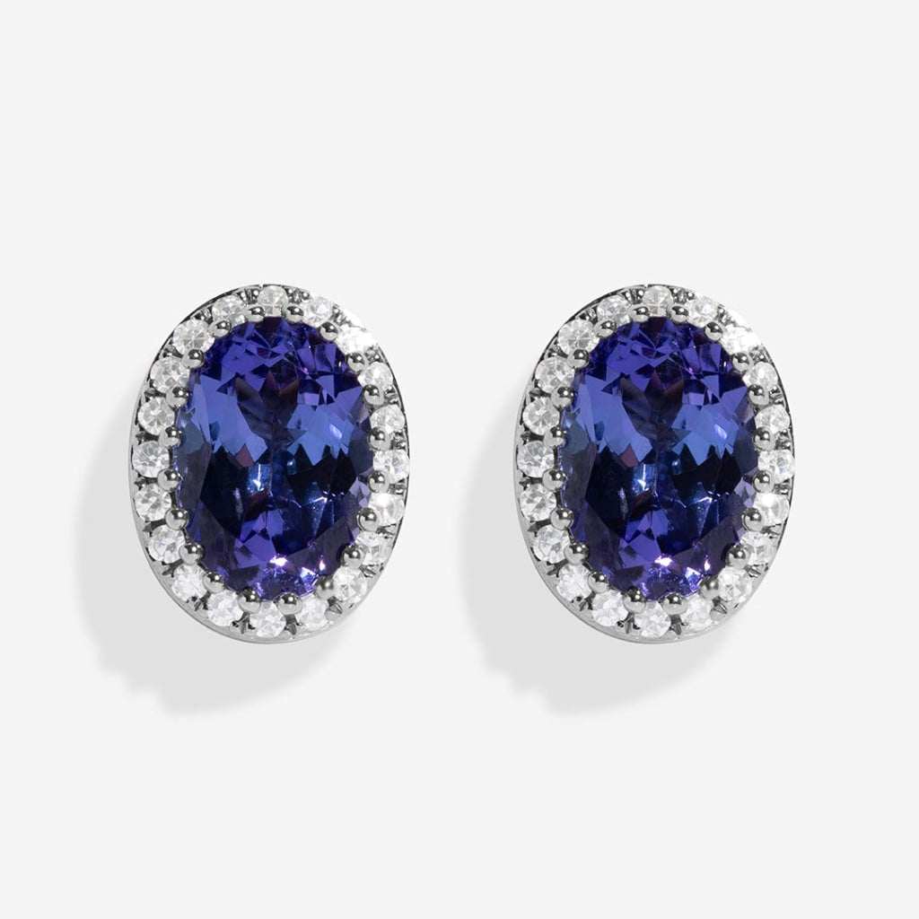 tanzanite diamond earrings on white background