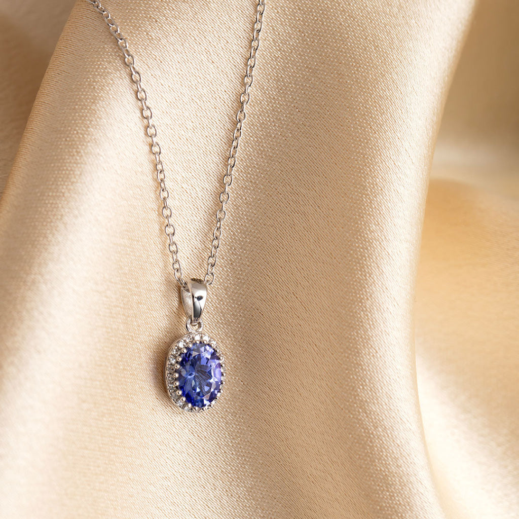 tanzanite diamond necklace on fabric