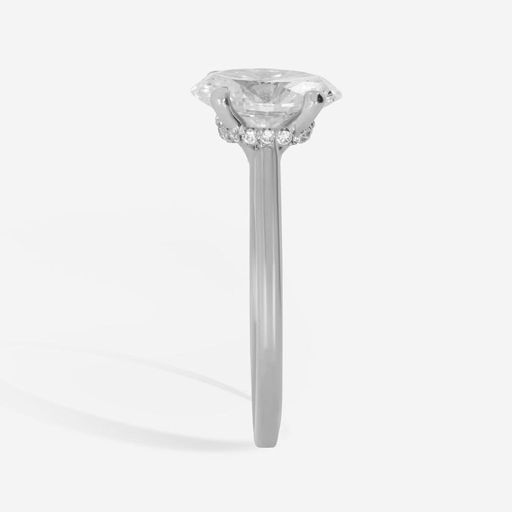 side view of platinum oval engagement ring 