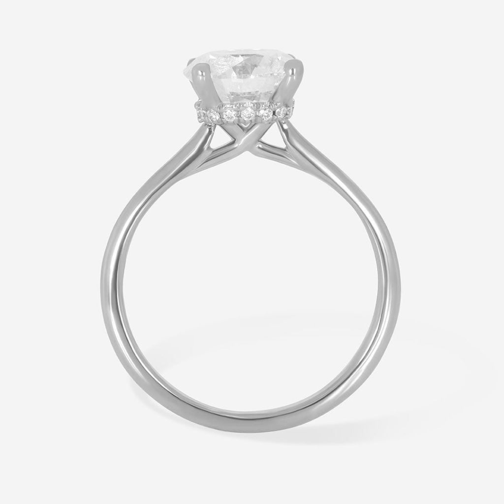 platinum oval engagement ring with hidden halo