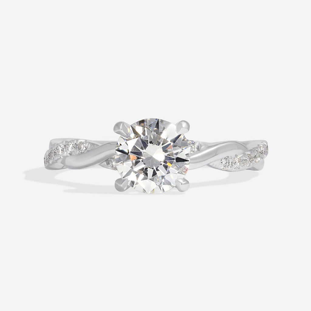Zephyr - 4 Claw round solitaire diamond engagement ring with twist diamond shoulders