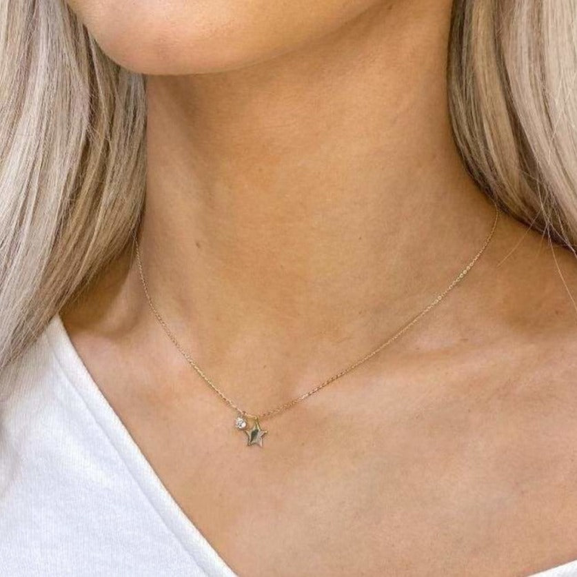 Woman wearing 9ct Gold Star Necklace