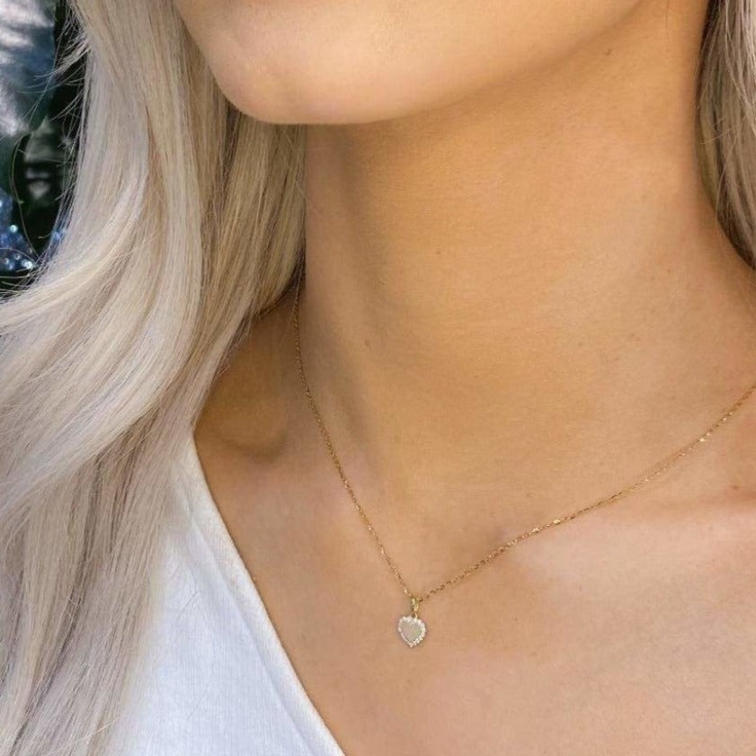 Woman wearing 9ct Gold Heart Necklace