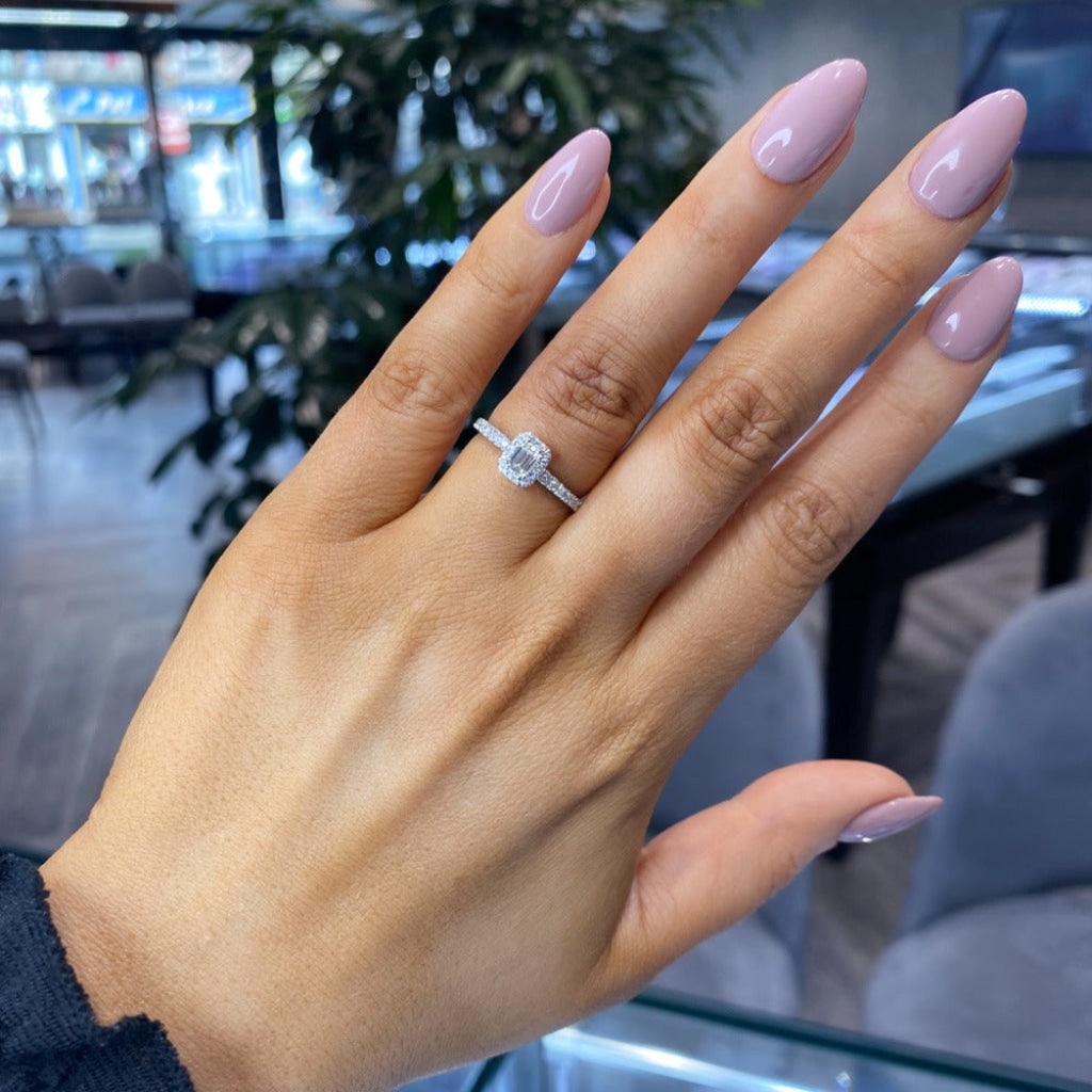 Platinum Emerald cut diamond engagement ring